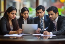 group-people-are-sitting-around-laptop-man-is-looking-screen